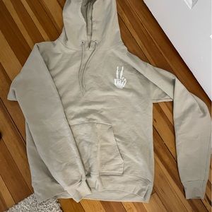 Skeleton peace sign tan hoodie size small